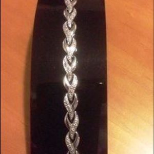 Diamond and white gold bracelet. 7 1/2 “